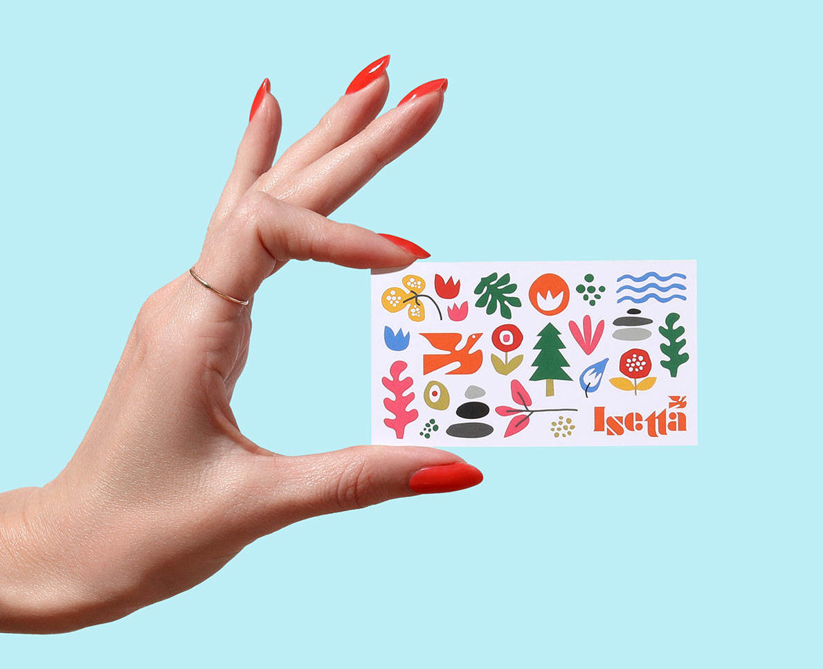A flat lay of recycled and sustainable paper stocks with natural elements.