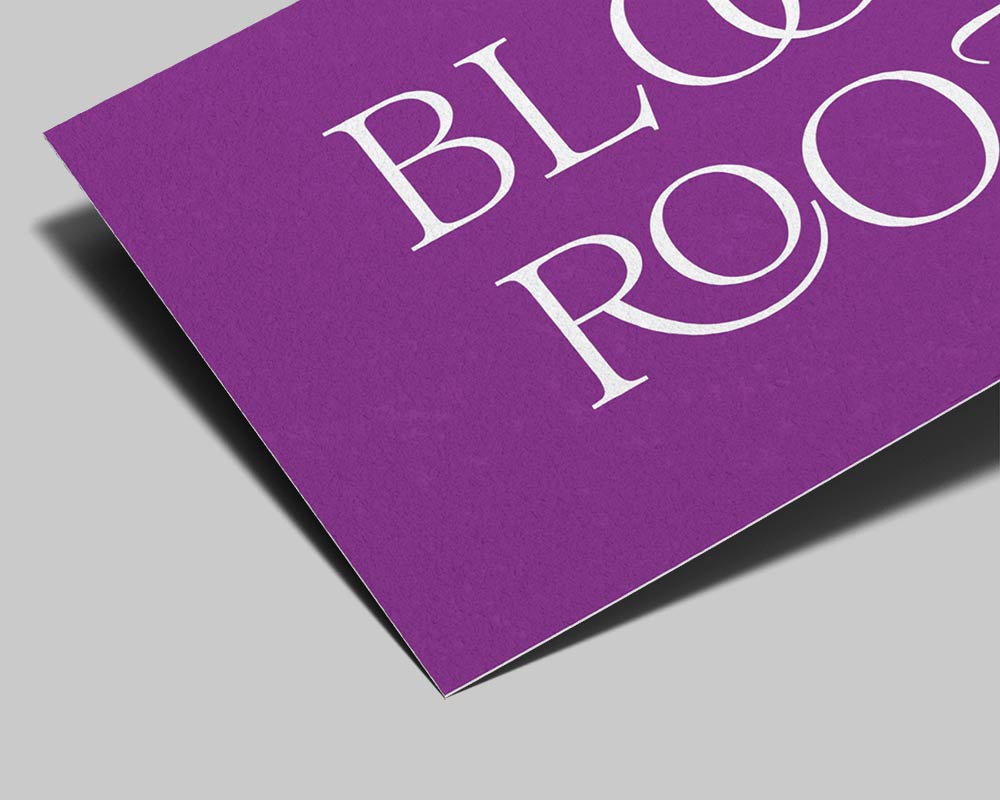 Close-up of Mohawk Superfine Ultrawhite business card showing natural uncoated texture and fine paper feel