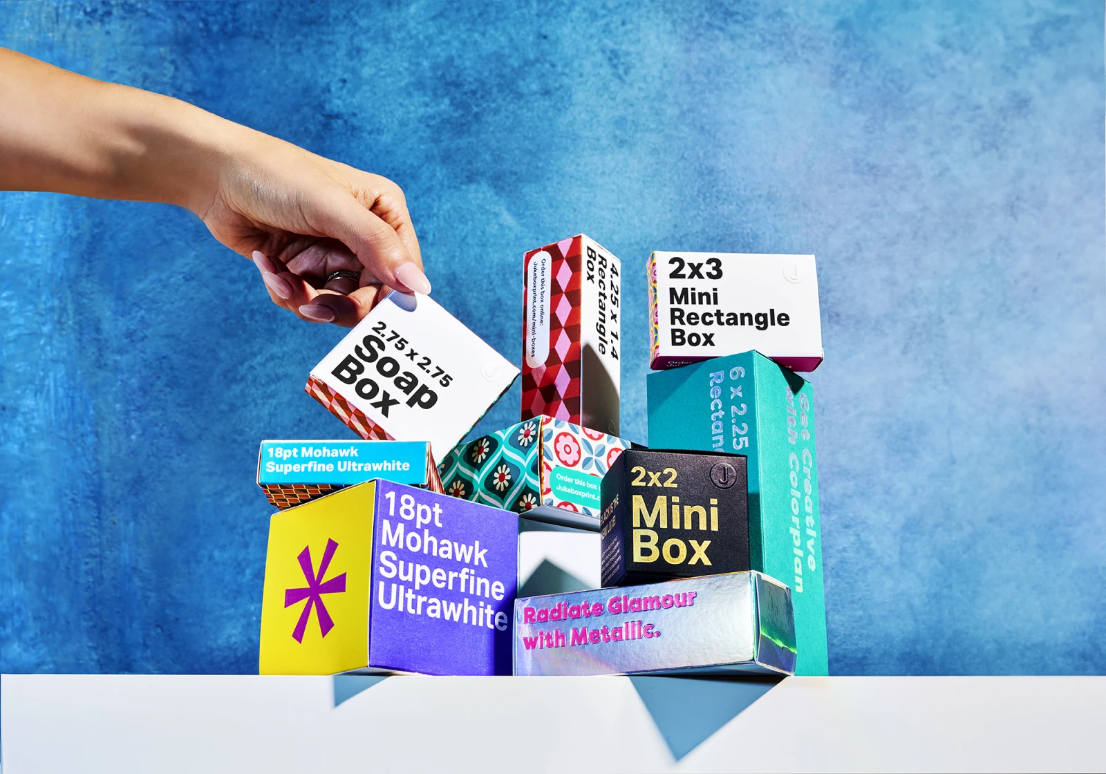 Colorful mini boxes in various shapes and sizes.