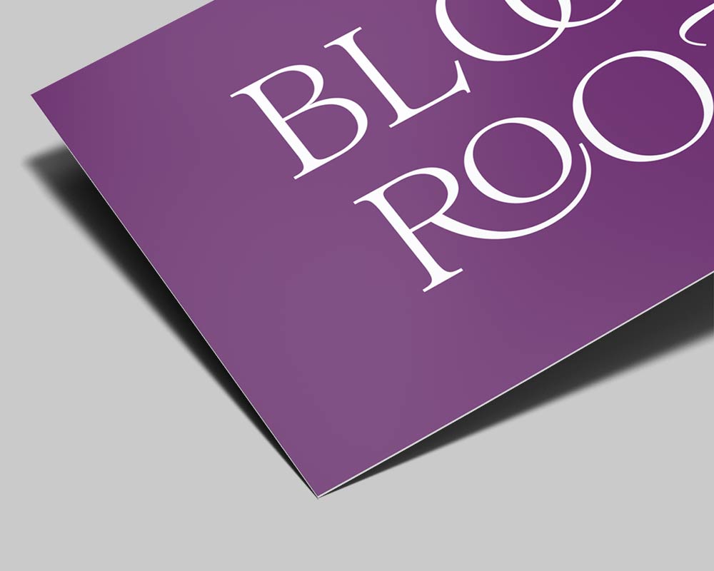 Close-up of Soft Touch business card finish showing velvety peach skin texture